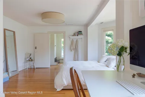 a spacious bathroom with a bathtub and sink