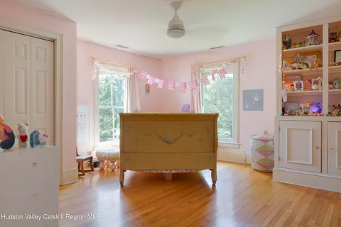 a view of a two chairs in the balcony