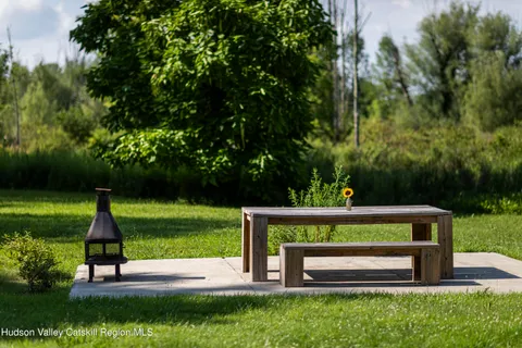 a vase of flowers sitting on a table