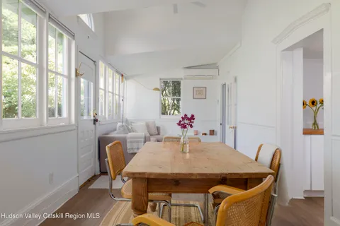 a bedroom with a bed and a television