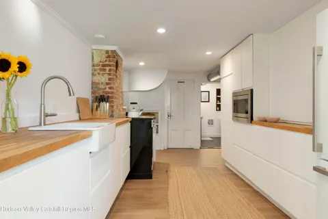 a view of a park with large trees