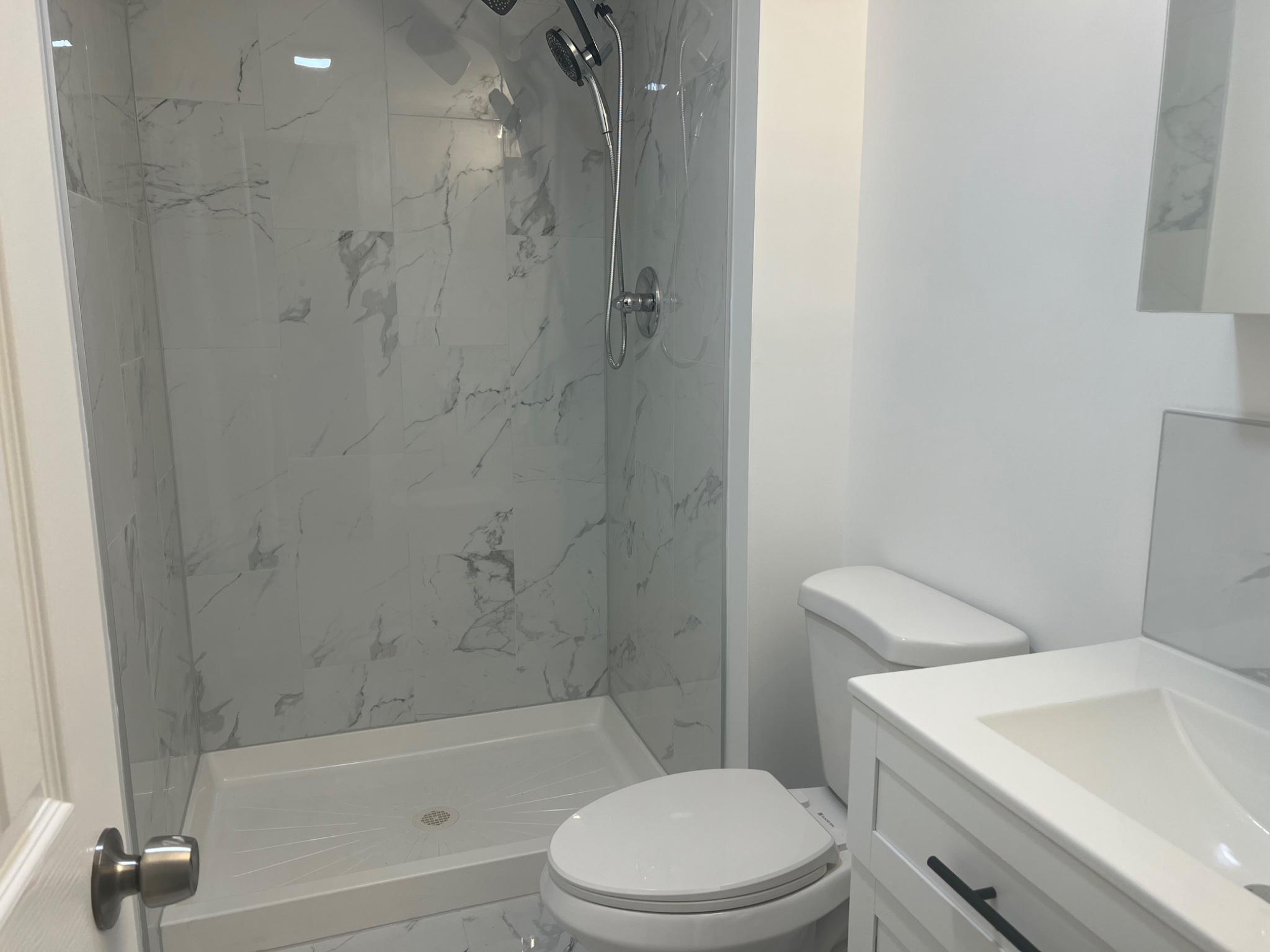 8425 Ridgeway Street Philadelphia, PA 19111 - Photo 14 of 22 Sleek modern bathroom retreat on lower level