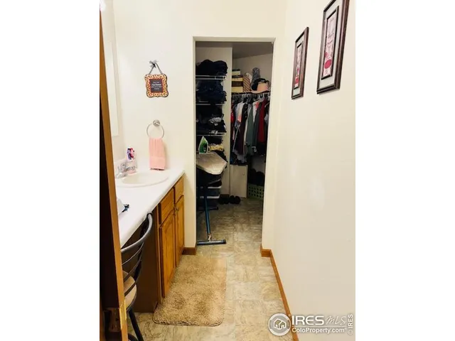 a bathroom with a toilet and a shower curtain