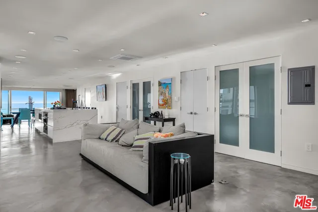 a bathroom with a double vanity sink mirror and shower