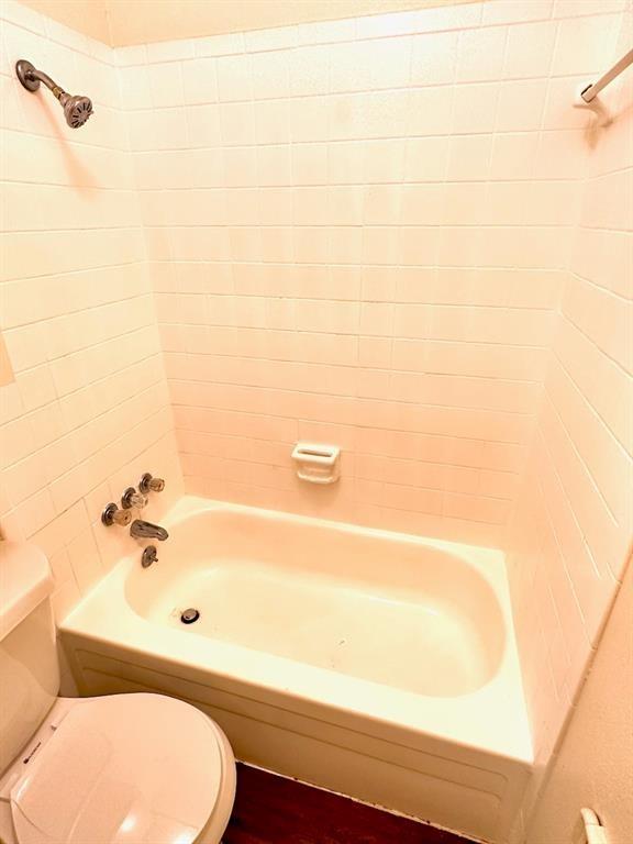 4204 Speedway, Unit 105 Austin, TX 78751 - Photo 10 of 13 a bathroom with a toilet and a sink