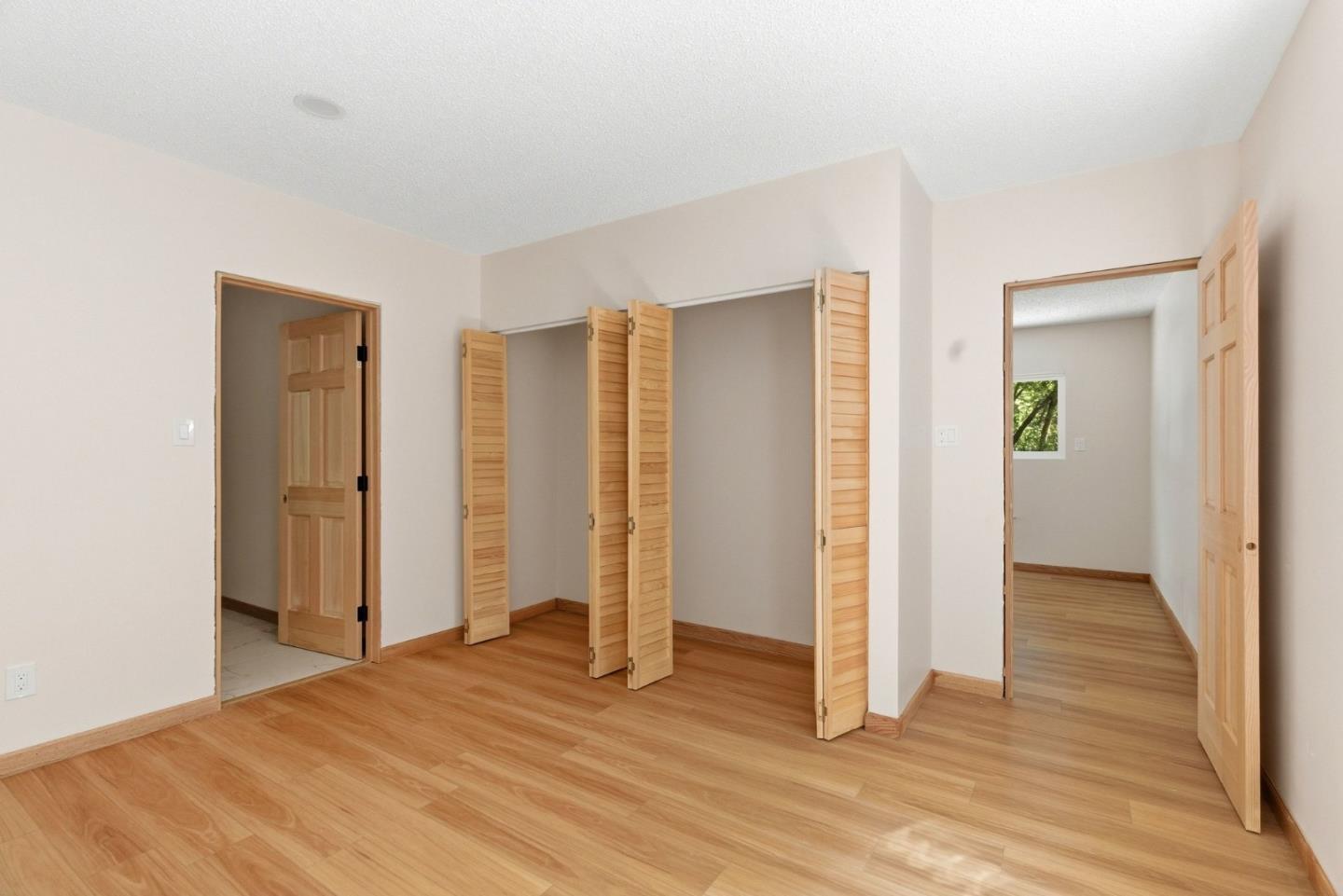 1460 Tucker Road Scotts Valley, CA 95066 - Photo 16 of 32 a view of a livingroom with wooden floor and closet area