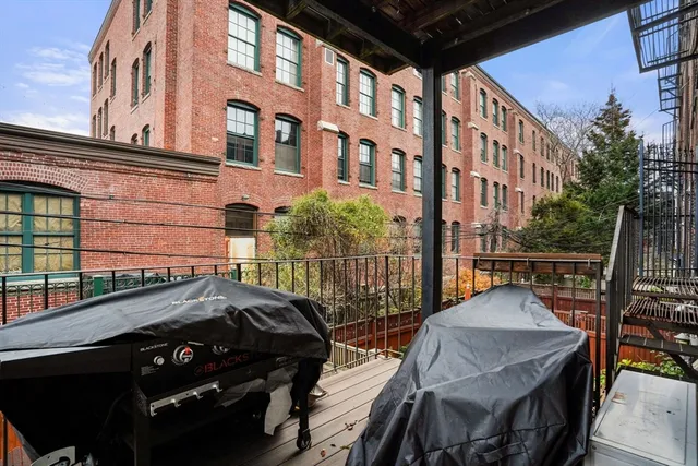 a view of a building from a balcony