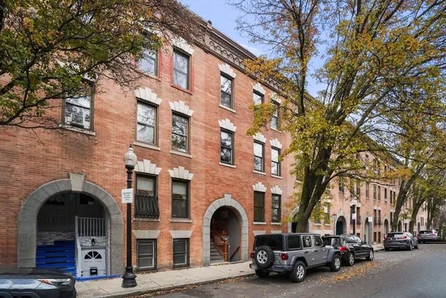 a view of car parked in front of building