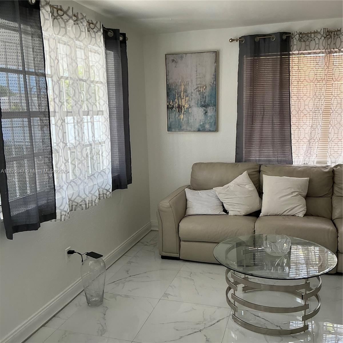 1924 Northwest 35th Street Miami, FL 33142 - Photo 11 of 29 a living room with furniture and a window