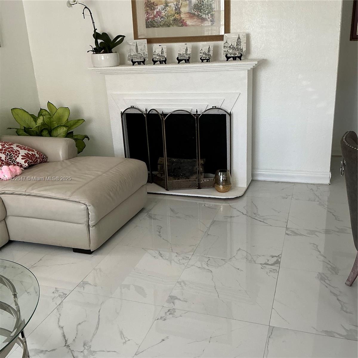 1924 Northwest 35th Street Miami, FL 33142 - Photo 12 of 29 a living room with furniture and a fireplace