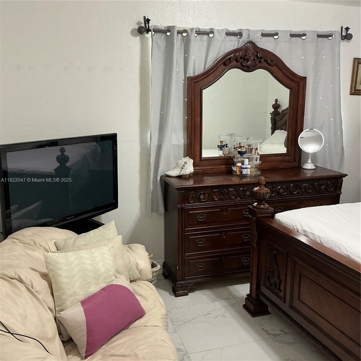 1924 Northwest 35th Street Miami, FL 33142 - Photo 21 of 29 a living room with furniture