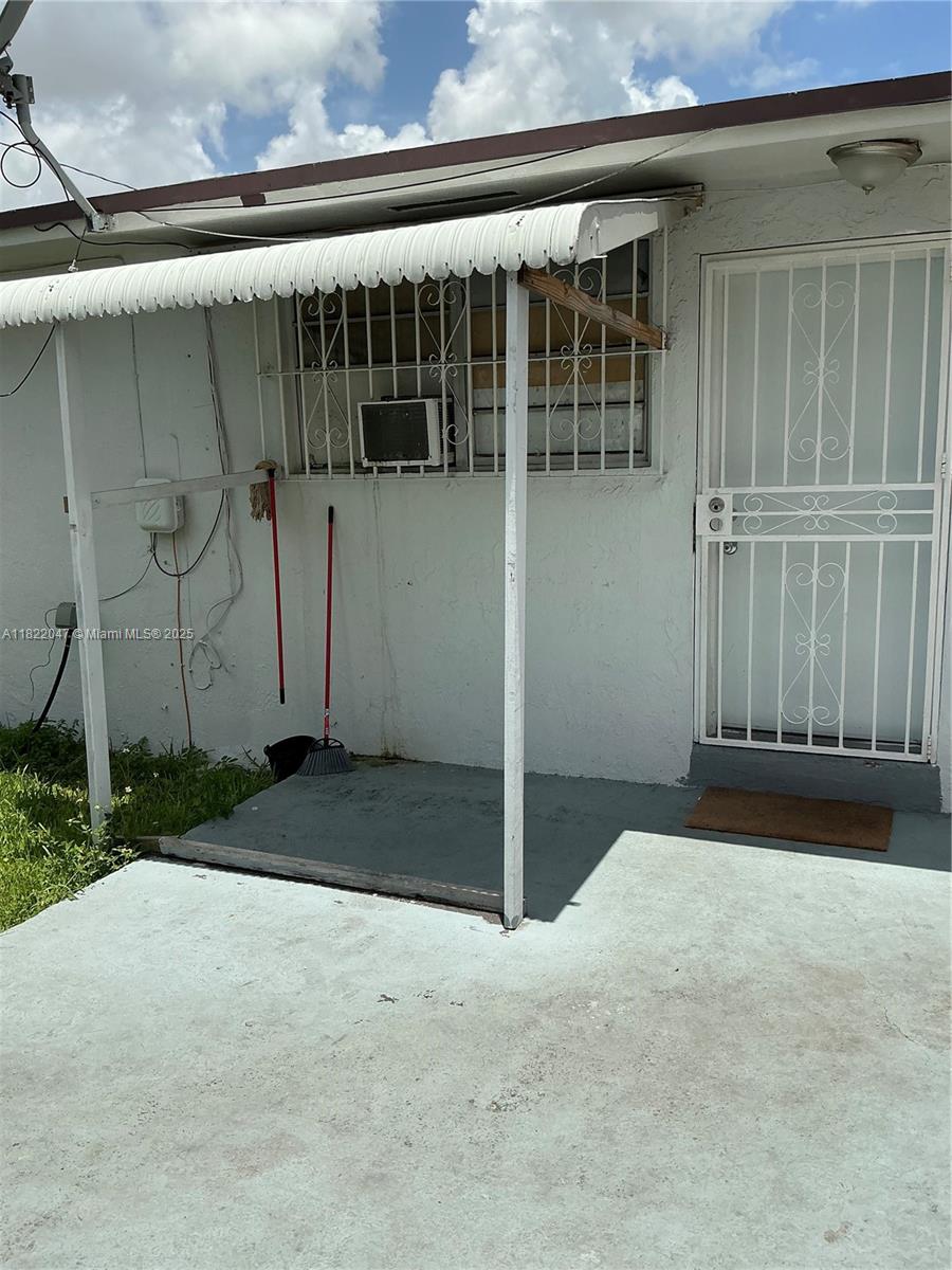 1924 Northwest 35th Street Miami, FL 33142 - Photo 29 of 29 a backyard of a house