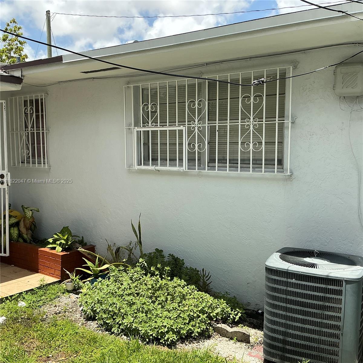 1924 Northwest 35th Street Miami, FL 33142 - Photo 8 of 29 a backyard of a house