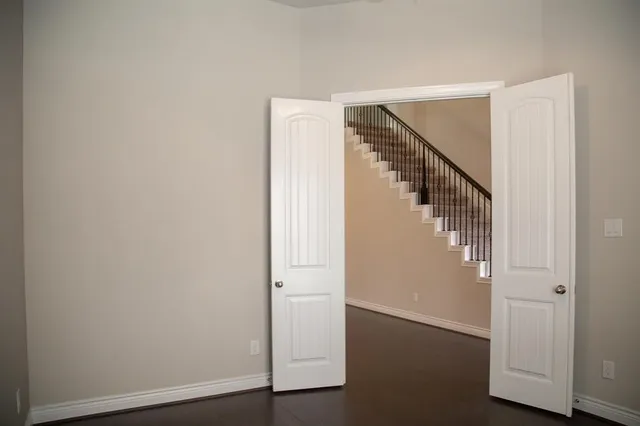 a view of entryway with wooden floor
