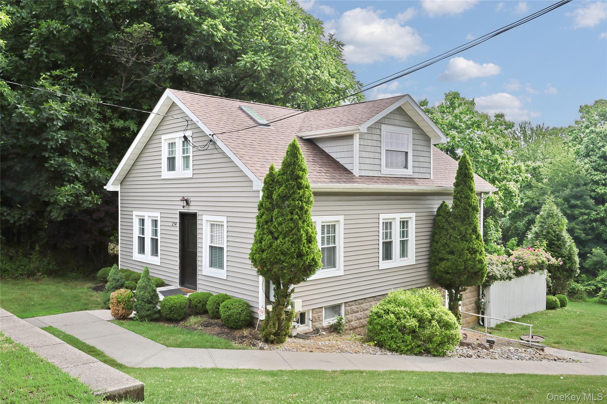 254 North Main Street New City, NY 10956 - Photo 3 of 37 a front view of a house with a yard
