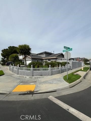 a swimming pool with outdoor seating and yard