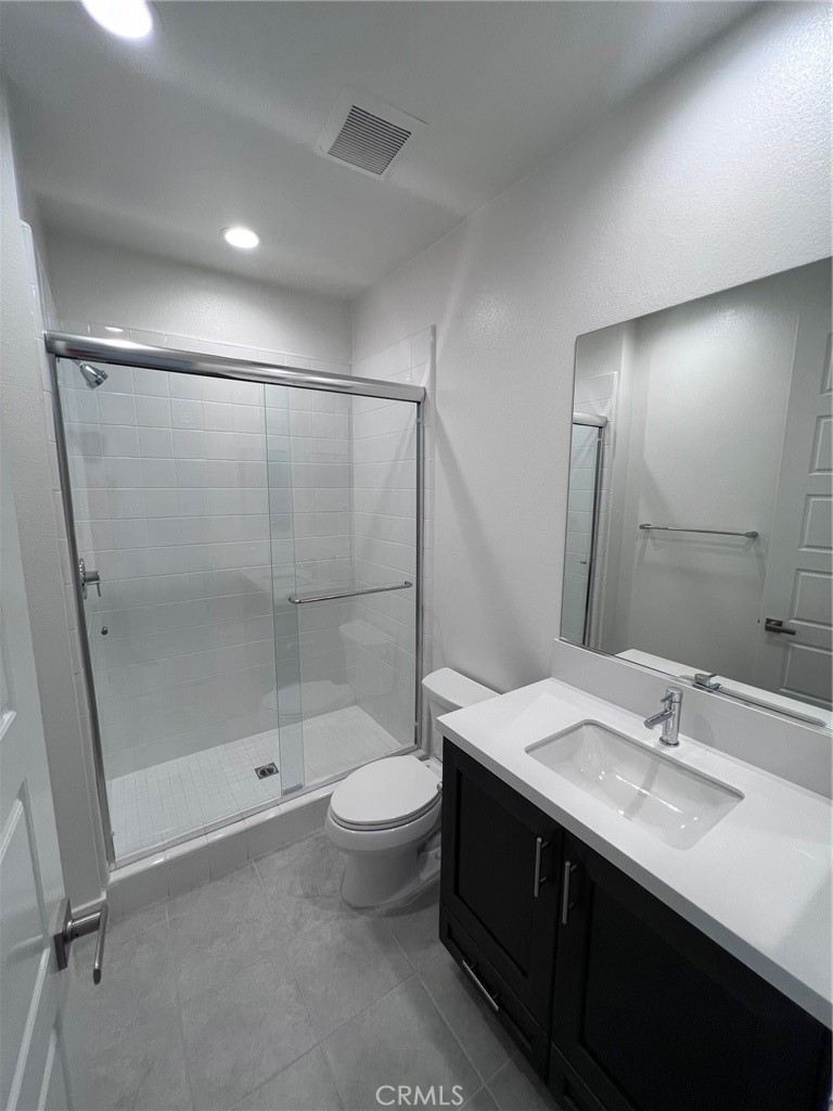 114 Draw Irvine, CA 92618 - Photo 11 of 48 a bathroom with a sink and a mirror
