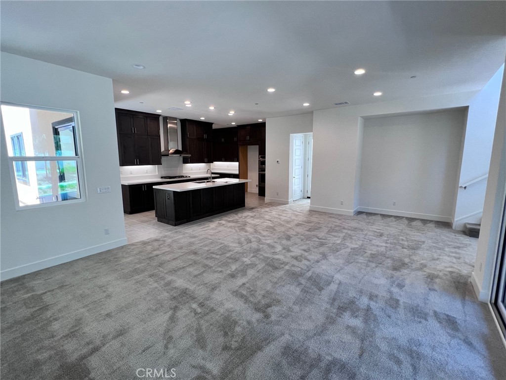 114 Draw Irvine, CA 92618 - Photo 12 of 48 a view of living room filled with furniture and window