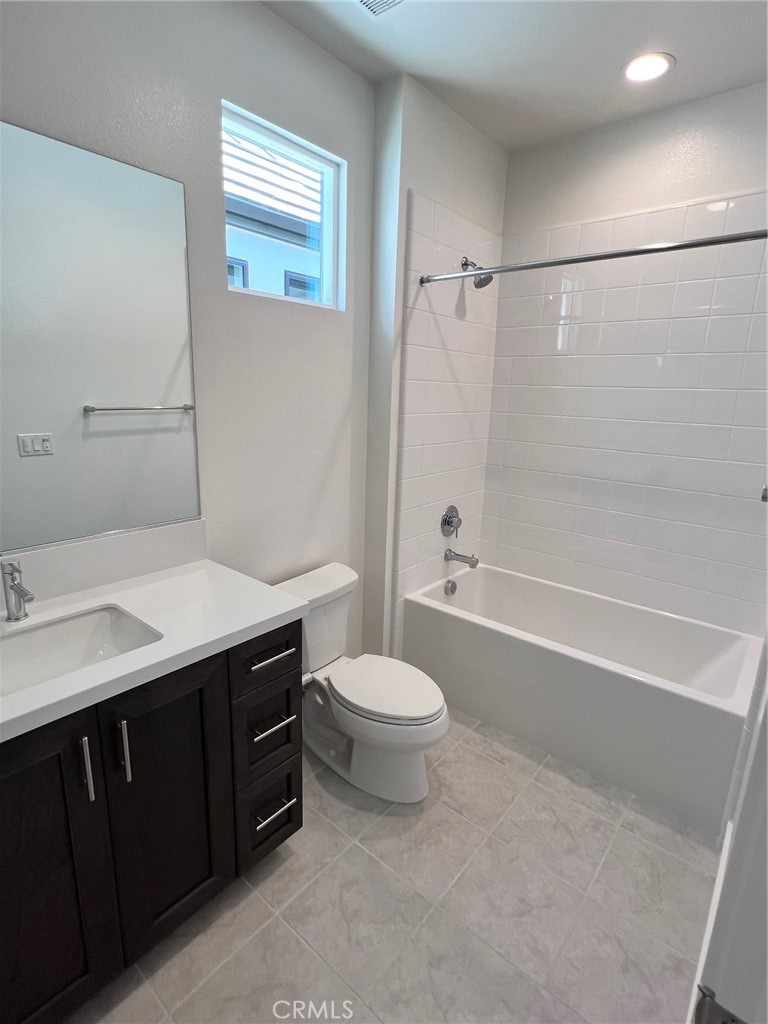 114 Draw Irvine, CA 92618 - Photo 24 of 48 a bathroom with a sink a toilet and shower