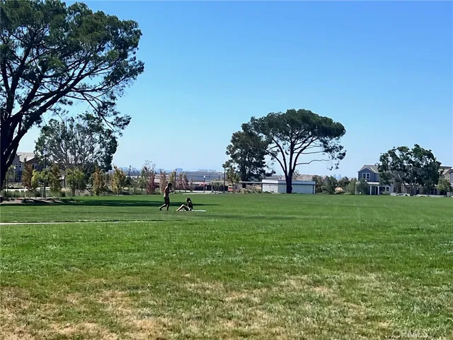 a view of a chairs and tables in patio