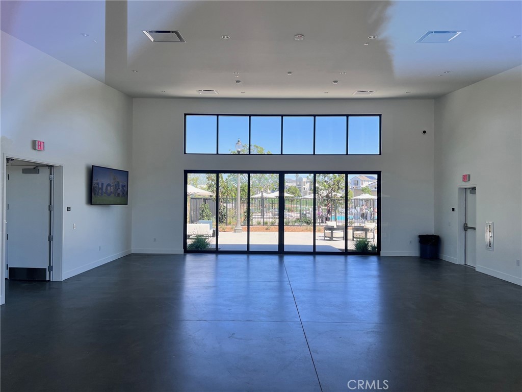 114 Draw Irvine, CA 92618 - Photo 44 of 48 a view of an empty room with a window and wooden floor