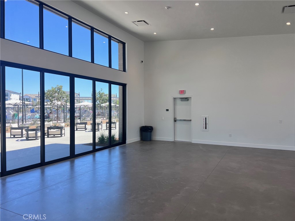 114 Draw Irvine, CA 92618 - Photo 45 of 48 a view of an empty room with window and wooden floor