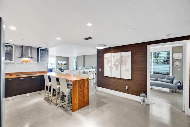 a bedroom with bed and a couch