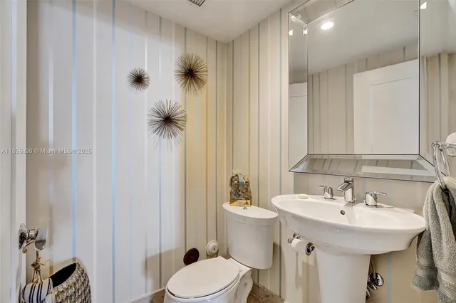 a view of a living room and balcony