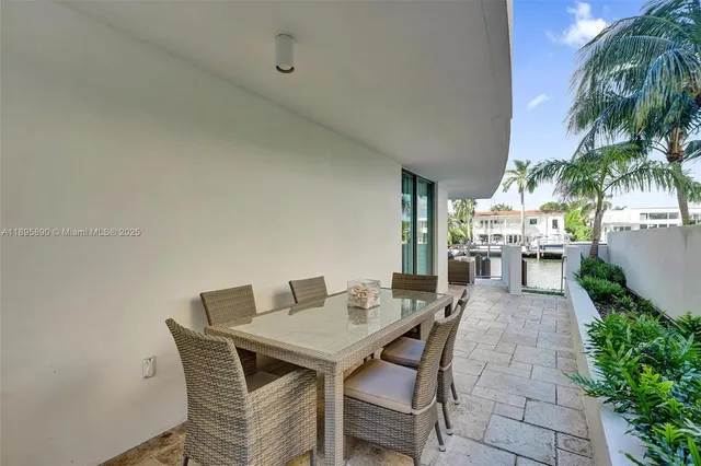a view of a swimming pool with a lounge chair