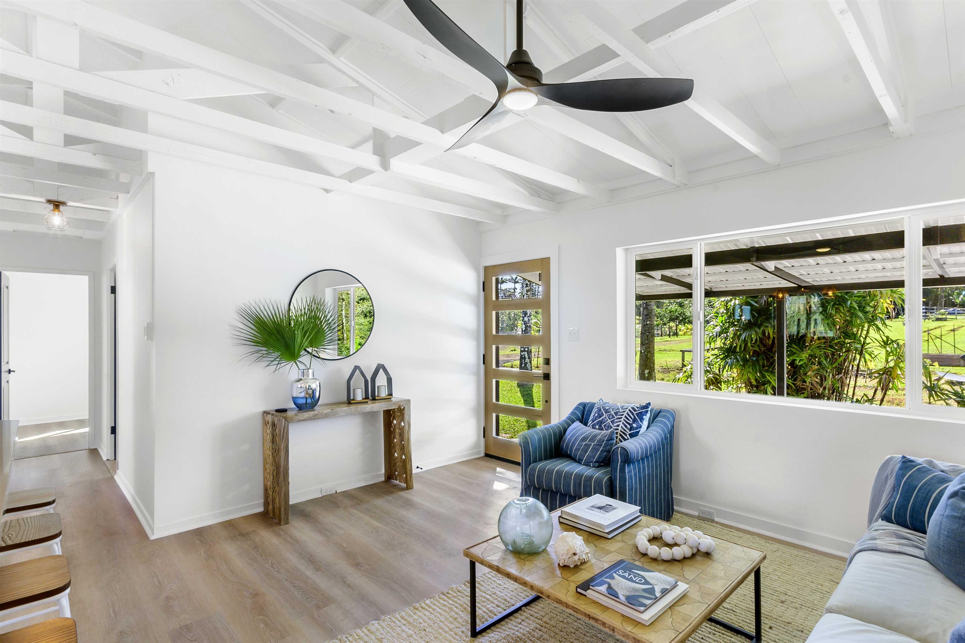 85 Honokaupu Place Haiku, HI 96708 - Photo 11 of 26 a living room with furniture and a potted plant