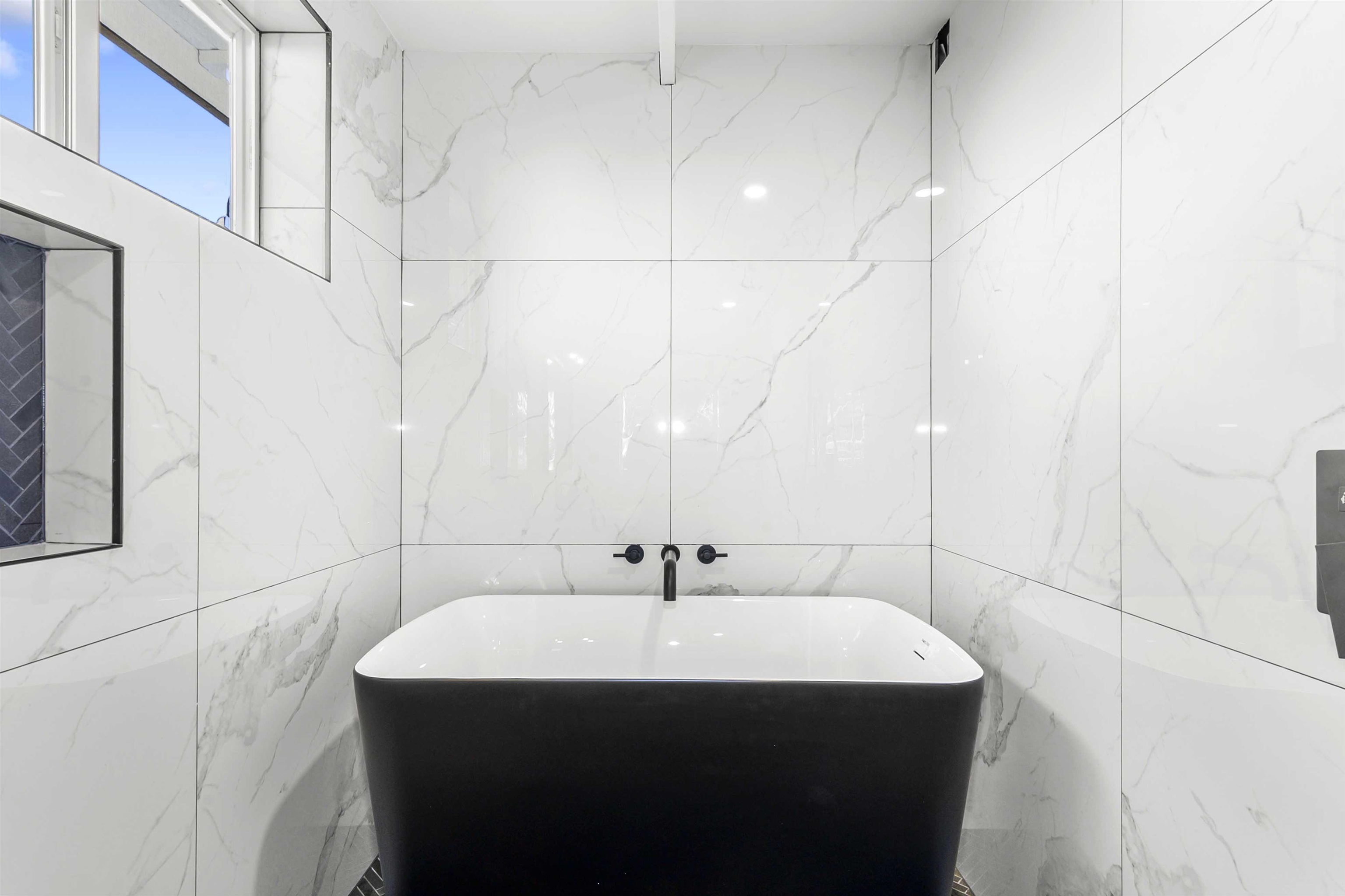 85 Honokaupu Place Haiku, HI 96708 - Photo 22 of 26 a bathroom with a sink and a mirror