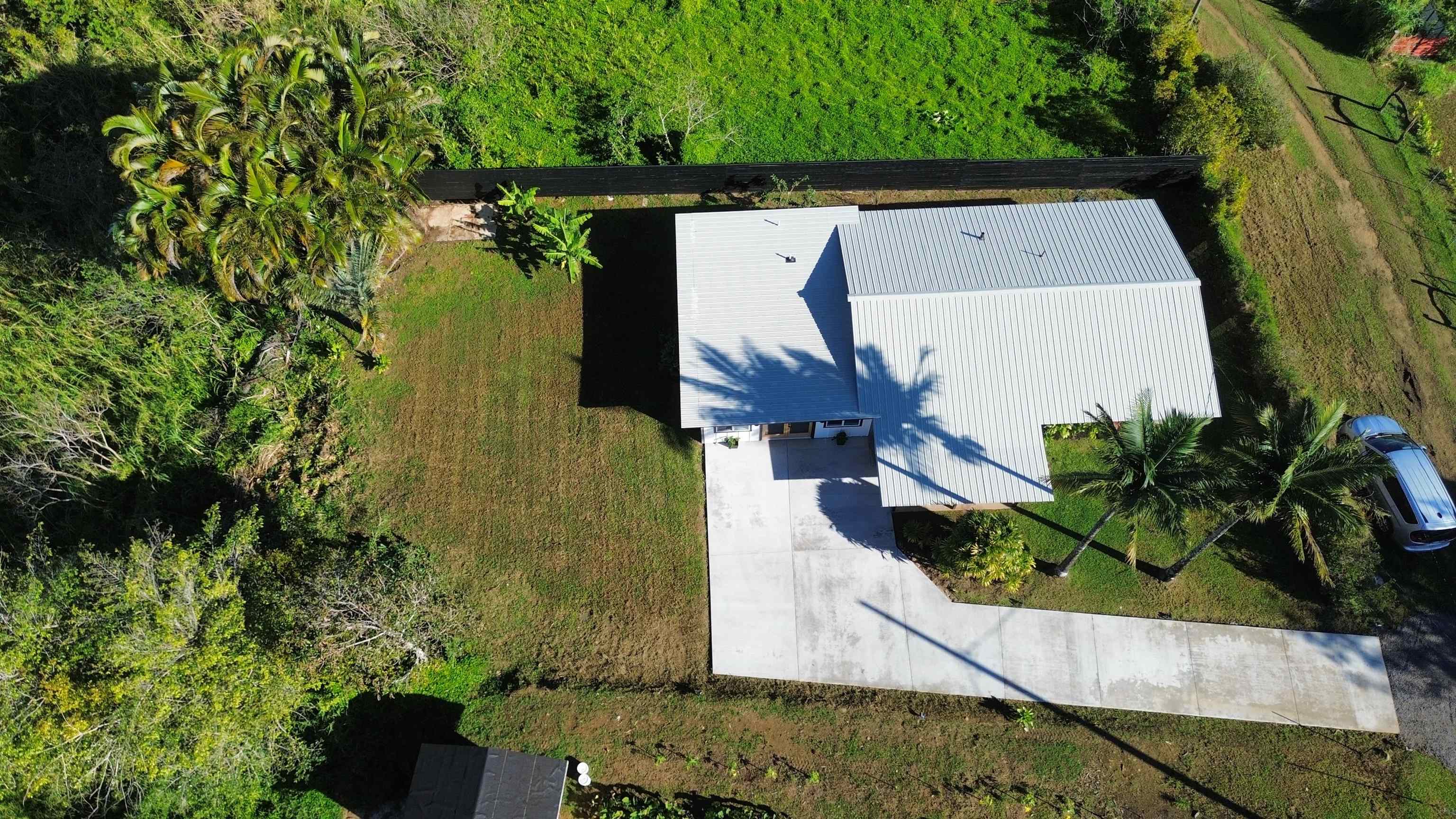 85 Honokaupu Place Haiku, HI 96708 - Photo 24 of 26 an aerial view of a house with a yard