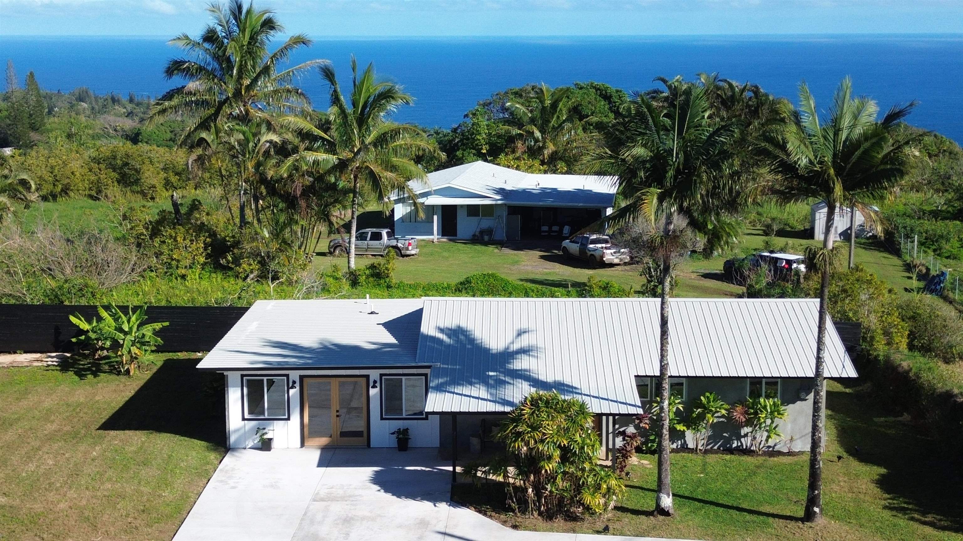 85 Honokaupu Place Haiku, HI 96708 - Photo 26 of 26 an aerial view of a house with garden space and sitting area