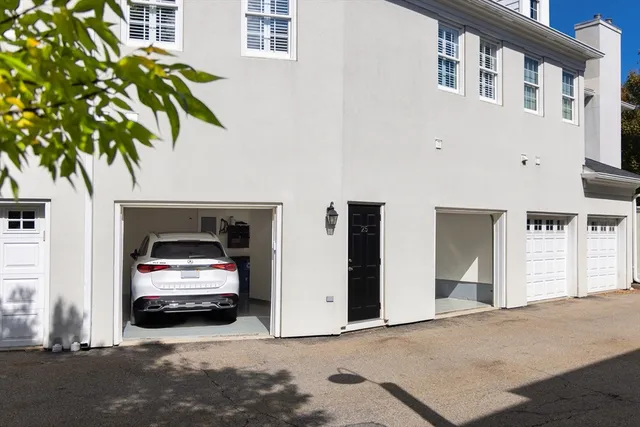 a view of a car park in front of house