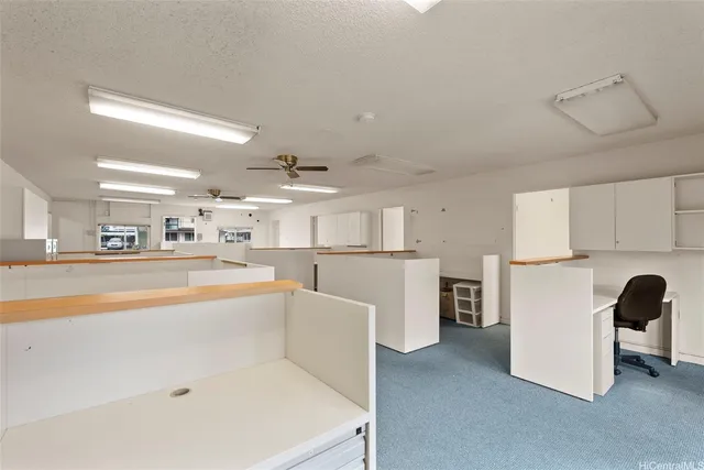 an empty room with a empty space and window