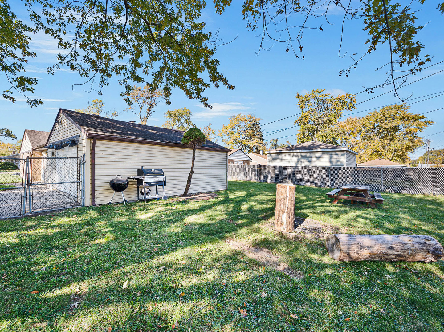 17057 Park Avenue Lansing, IL 60438 - Photo 16 of 17 a house view with a garden space