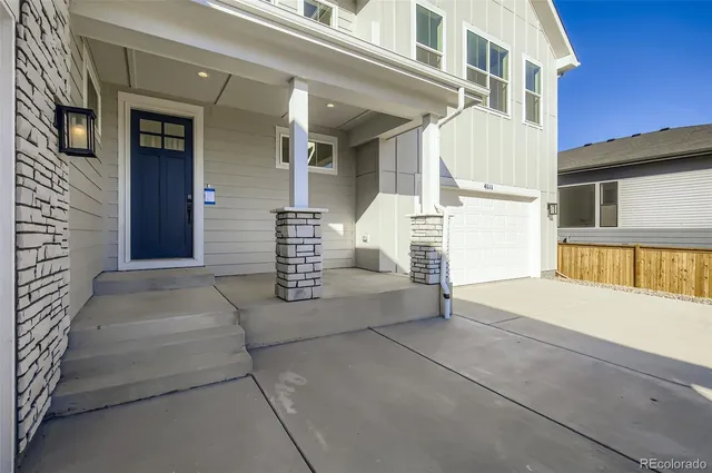 a view of a house with a garage