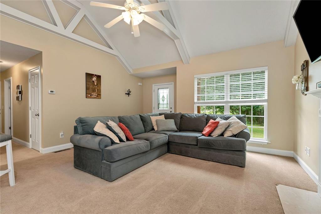 1044 Lothridge Road Cleveland, GA 30528 - Photo 12 of 40 a living room with furniture and a large window