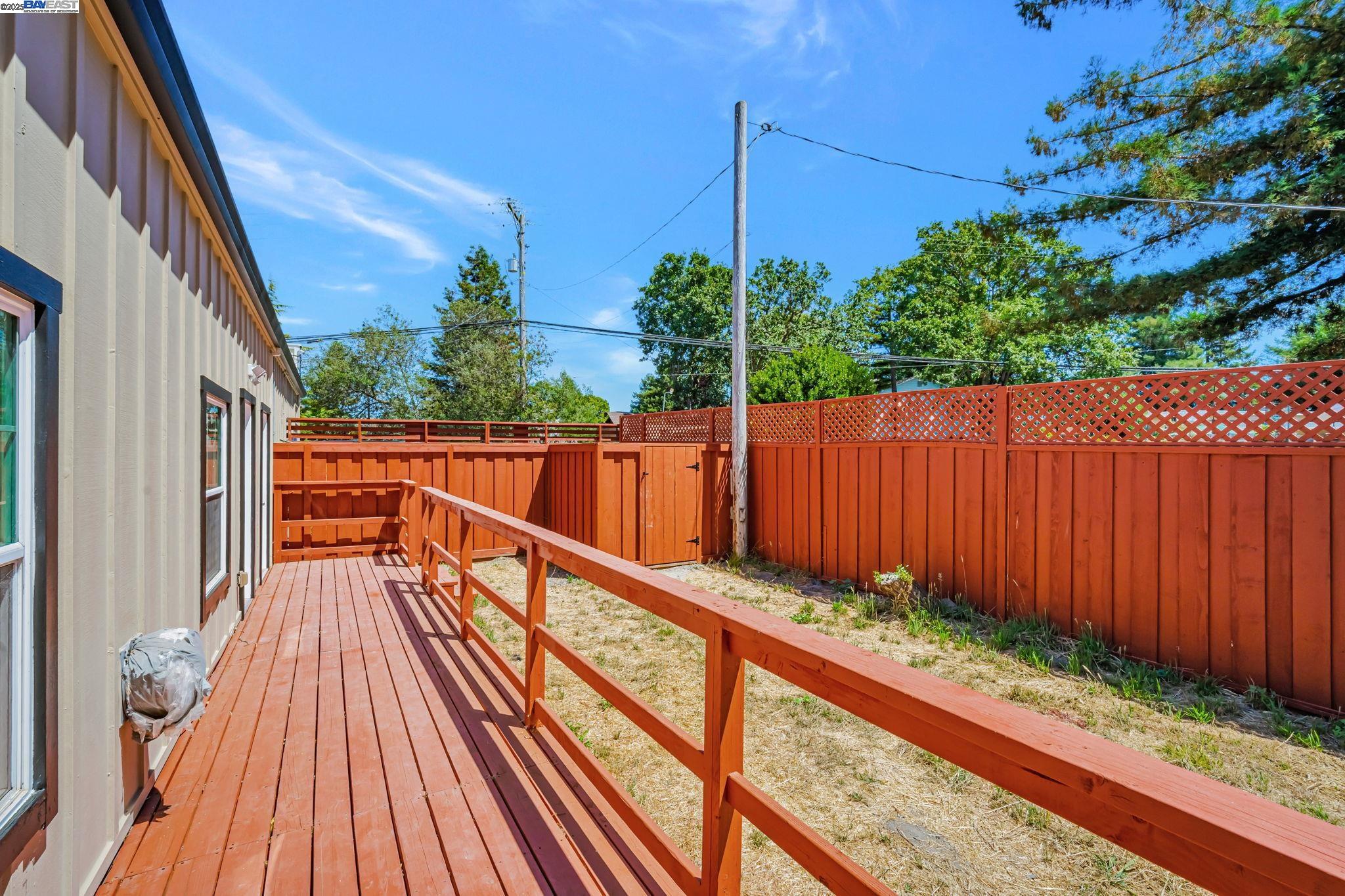 3920 Gravenstein Highway South Sebastopol, CA 95472 - Photo 35 of 48 a view of balcony with wooden floor and potted plants