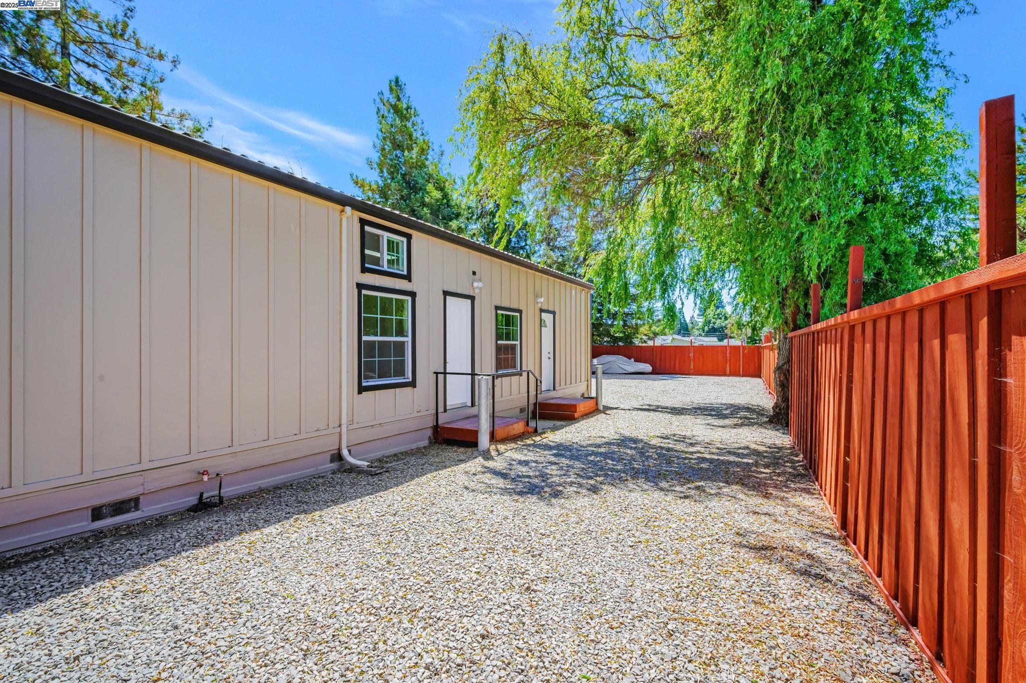 3920 Gravenstein Highway South Sebastopol, CA 95472 - Photo 45 of 48 a view of a house with backyard and sitting area
