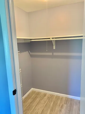 a view of small space with racks on the wall