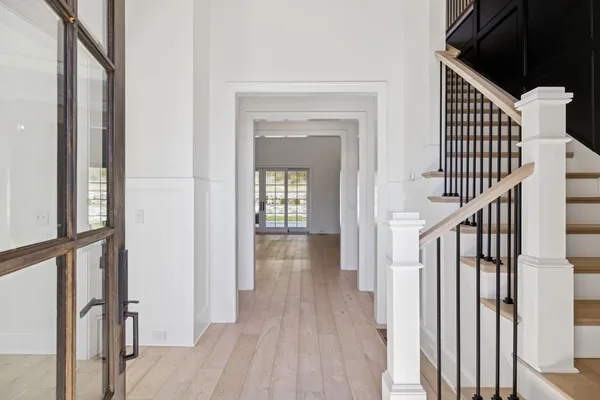 a view of entryway with wooden floor