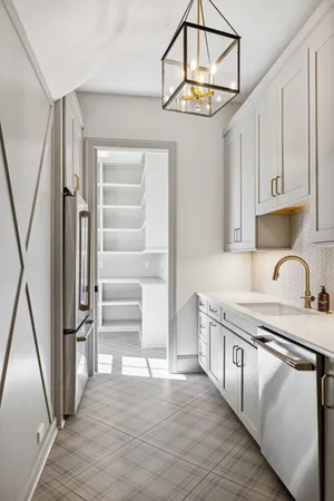 a bathroom with a tub and shower