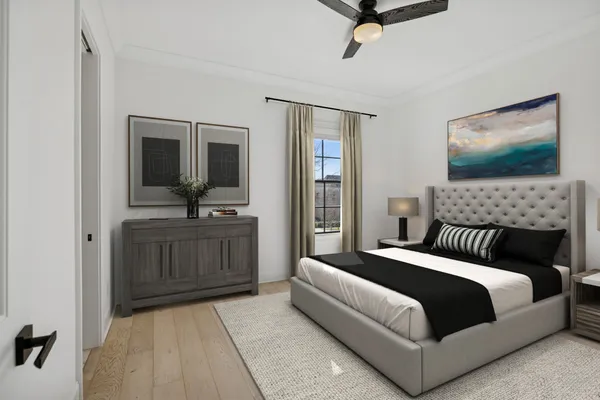 an empty room with a flat screen tv and windows