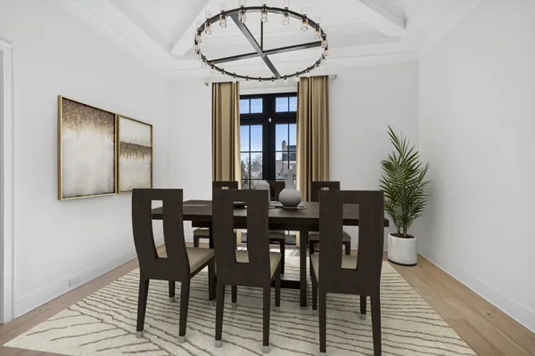 a view of a room with a sink and a chandelier