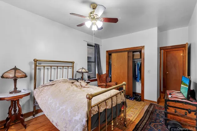 a bed room with a bed and a chandelier