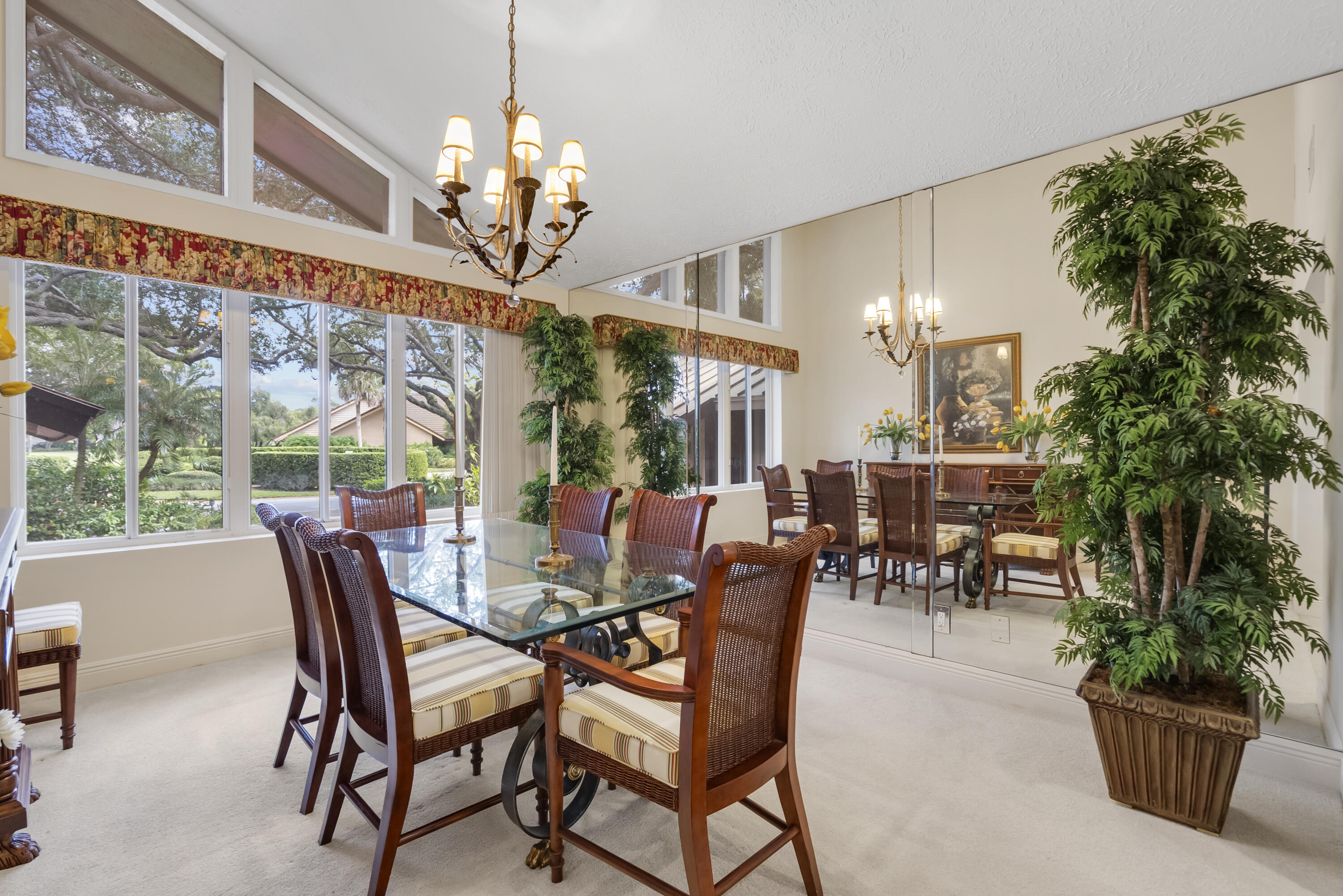5011 Southeast Burning Tree Circle Stuart, FL 34997 - Photo 18 of 58 a view of a dining room with furniture window and outside view