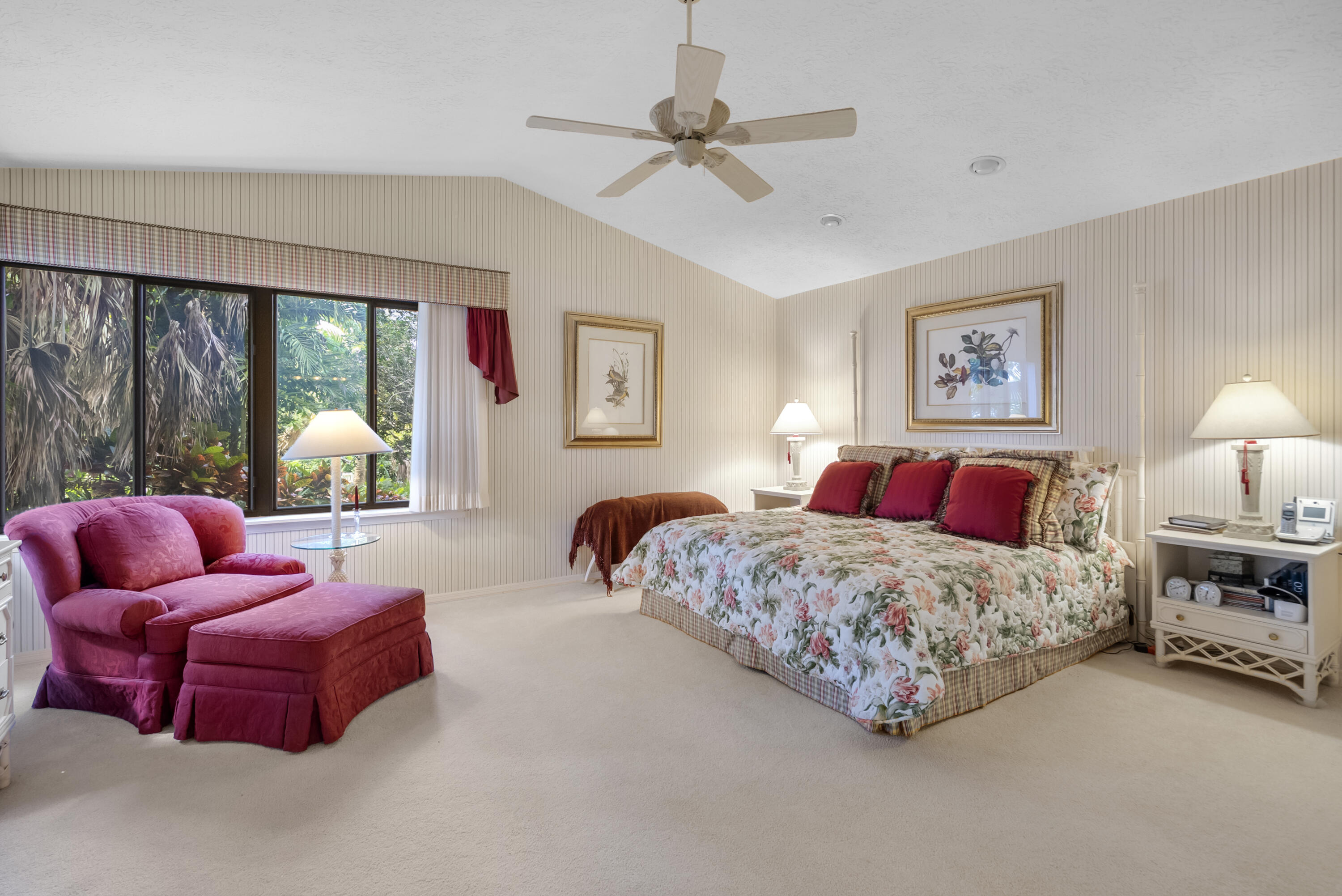 5011 Southeast Burning Tree Circle Stuart, FL 34997 - Photo 24 of 58 a bedroom with bed and window