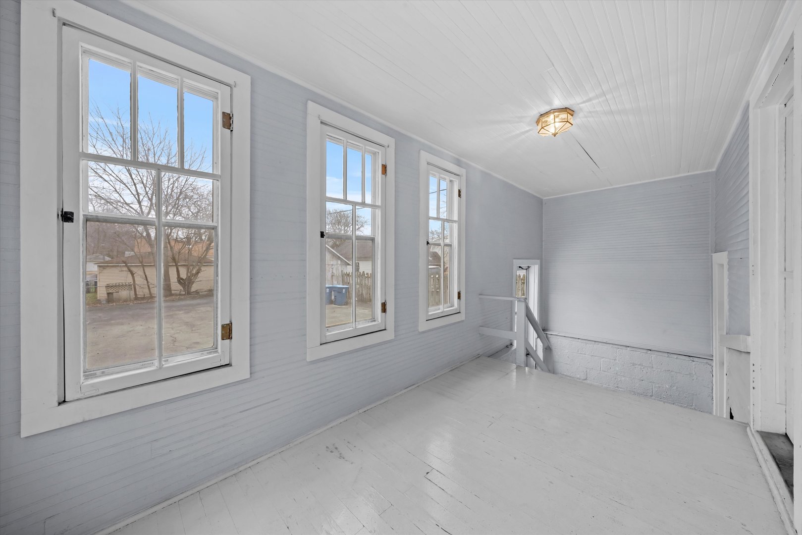 1443 Main Street Crete, IL 60417 - Photo 3 of 19 a view of an empty room with a window