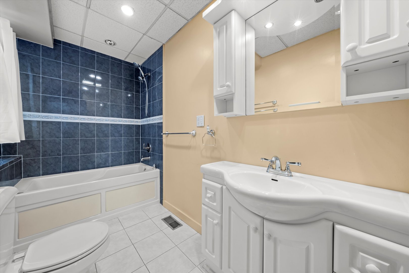 1443 Main Street Crete, IL 60417 - Photo 9 of 19 a bathroom with a sink a toilet and shower